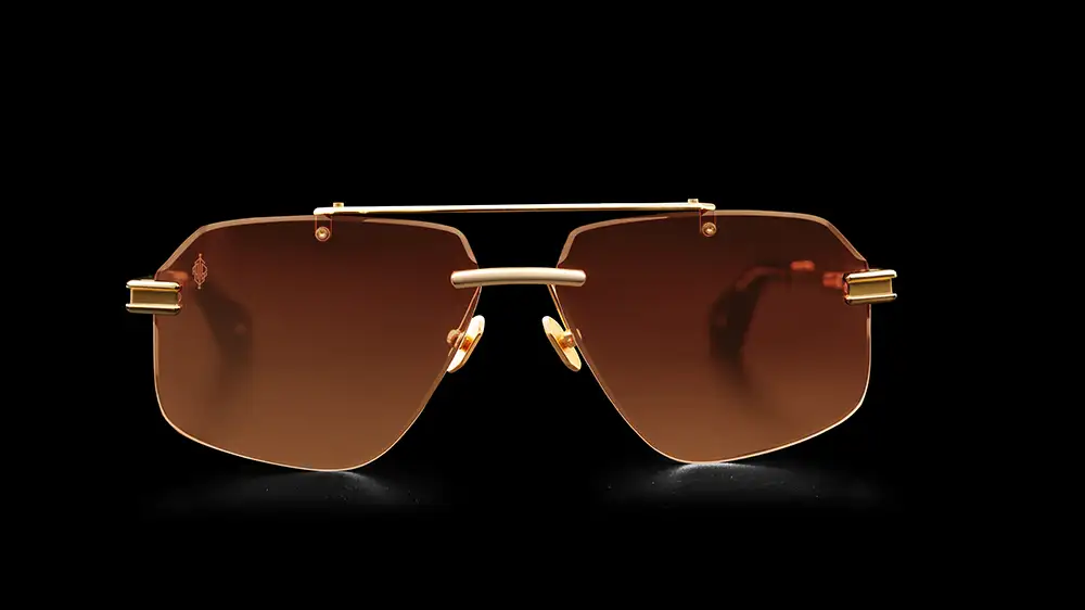 Front view of Agbassio The Diplomat eyewear in Havana acetate with gold titanium detailing and dark green lenses