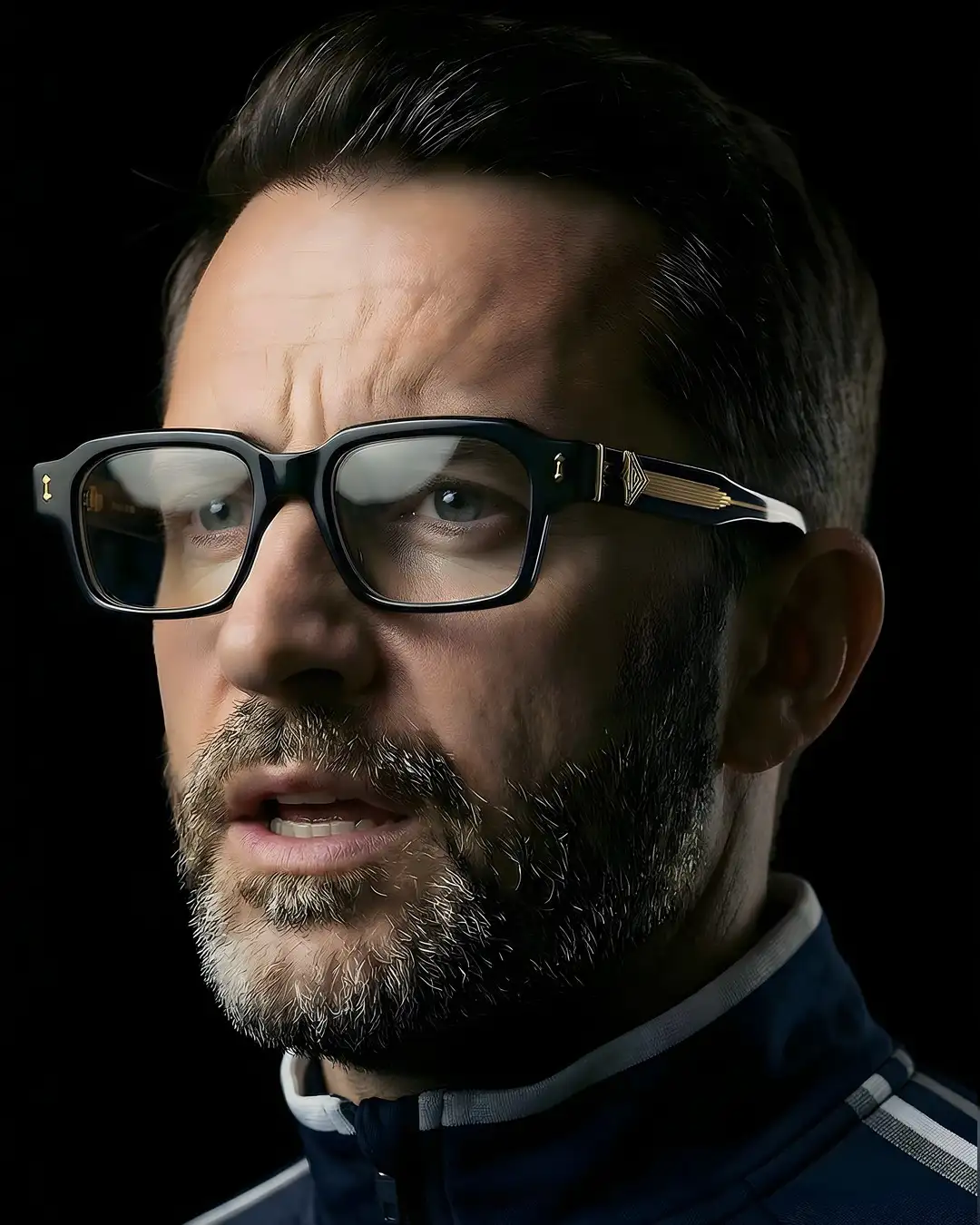 Agbassio The Strategist black acetate eyewear worn by a bearded male model in a relaxed navy look